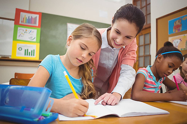 Adult helping a child with homework